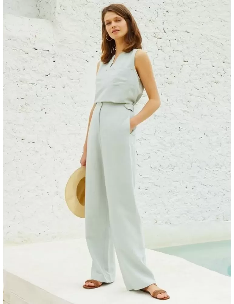 Paz Torras light green linen and silk palazzo trousers