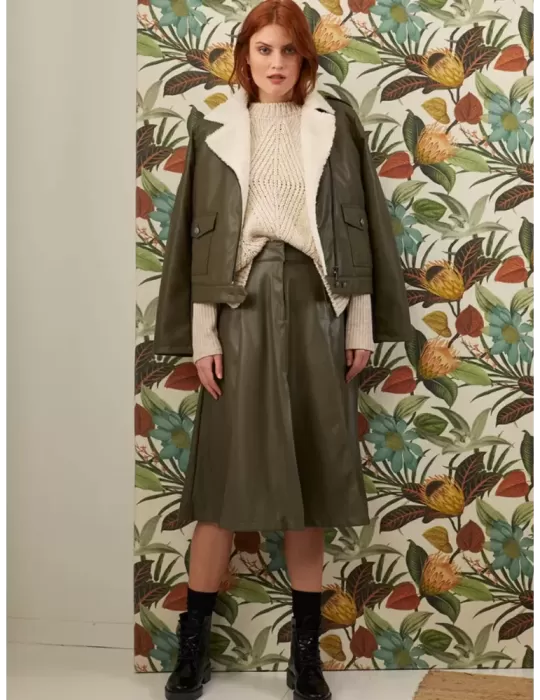 Paz Torras faux leather green midi A shape skirt front split