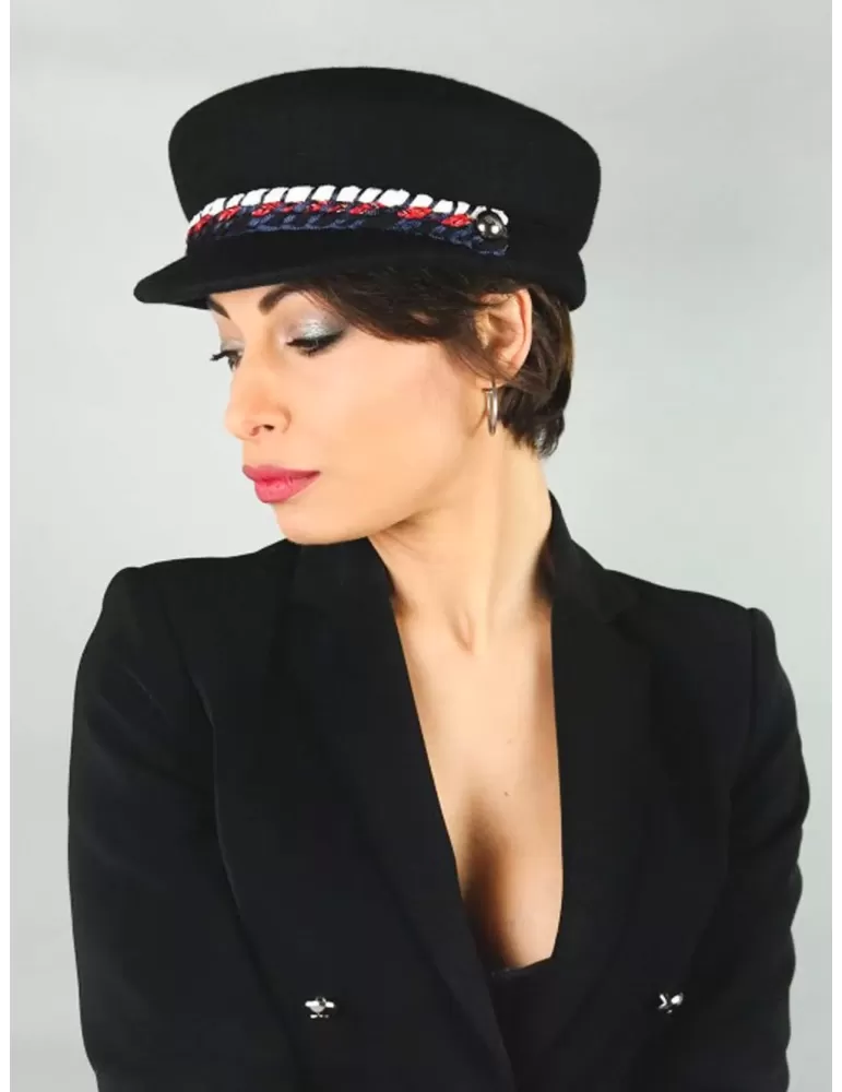 Black wool train conductor hat with white and red rope Black wool train conductor hat with white and red rope