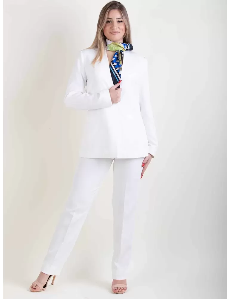 Paz Torras white tuxedo jacket with trousers suit