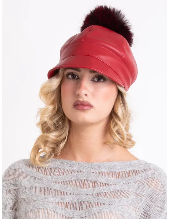 Red rain-resistant riding cap with pom-pom