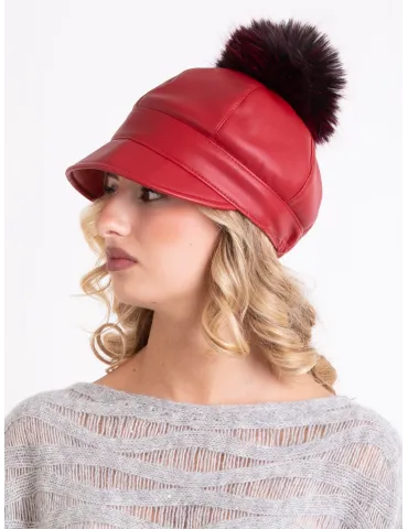 Red rain-resistant riding cap with pom-pom