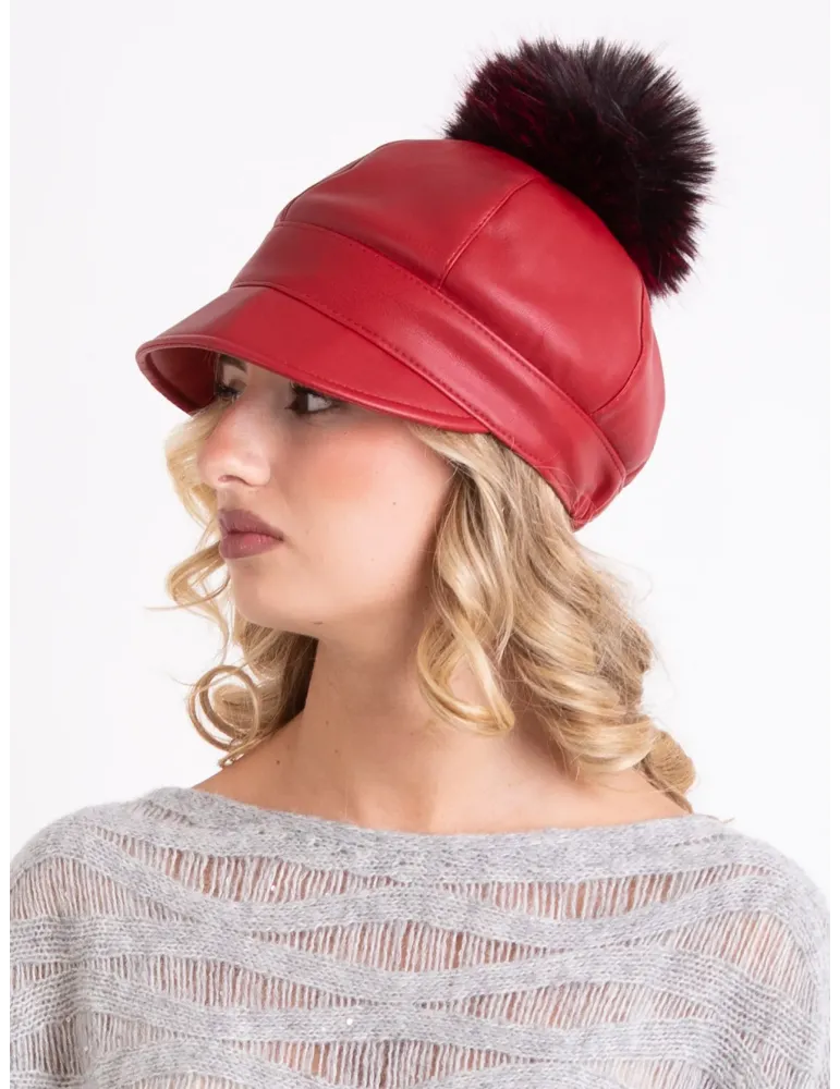 Red rain-resistant riding cap with pom-pom