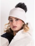 White faux leather rain-resistant riding cap with black pom-pom