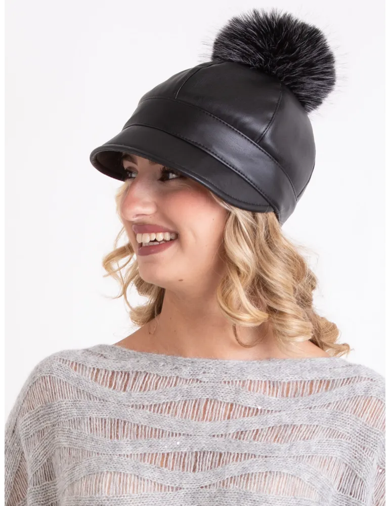 Black faux leather rain-resistant riding cap with pom-pom