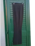 F. Mercuriali black flared trousers with rhinestones