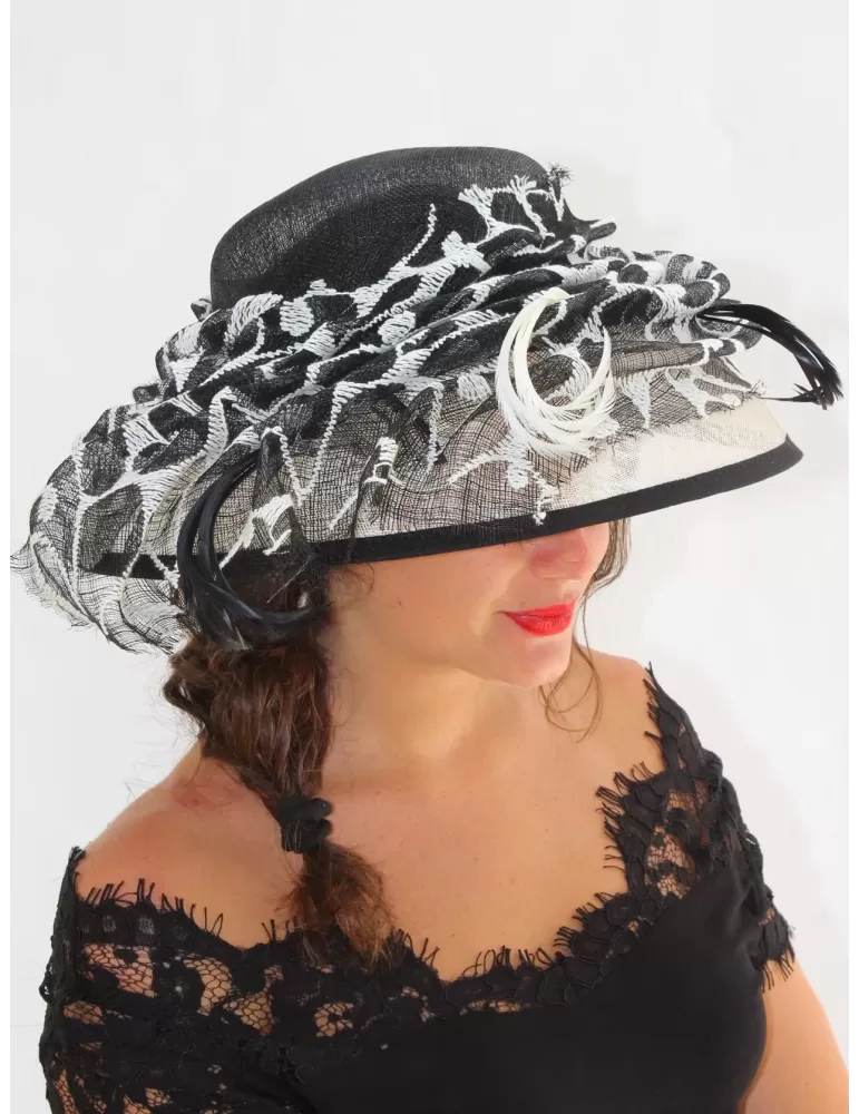 Complit Italian fashion hats | Black and white paper and feathers wedding hat Complit Italian fashion hats | Black and white paper and feathers wedding hat